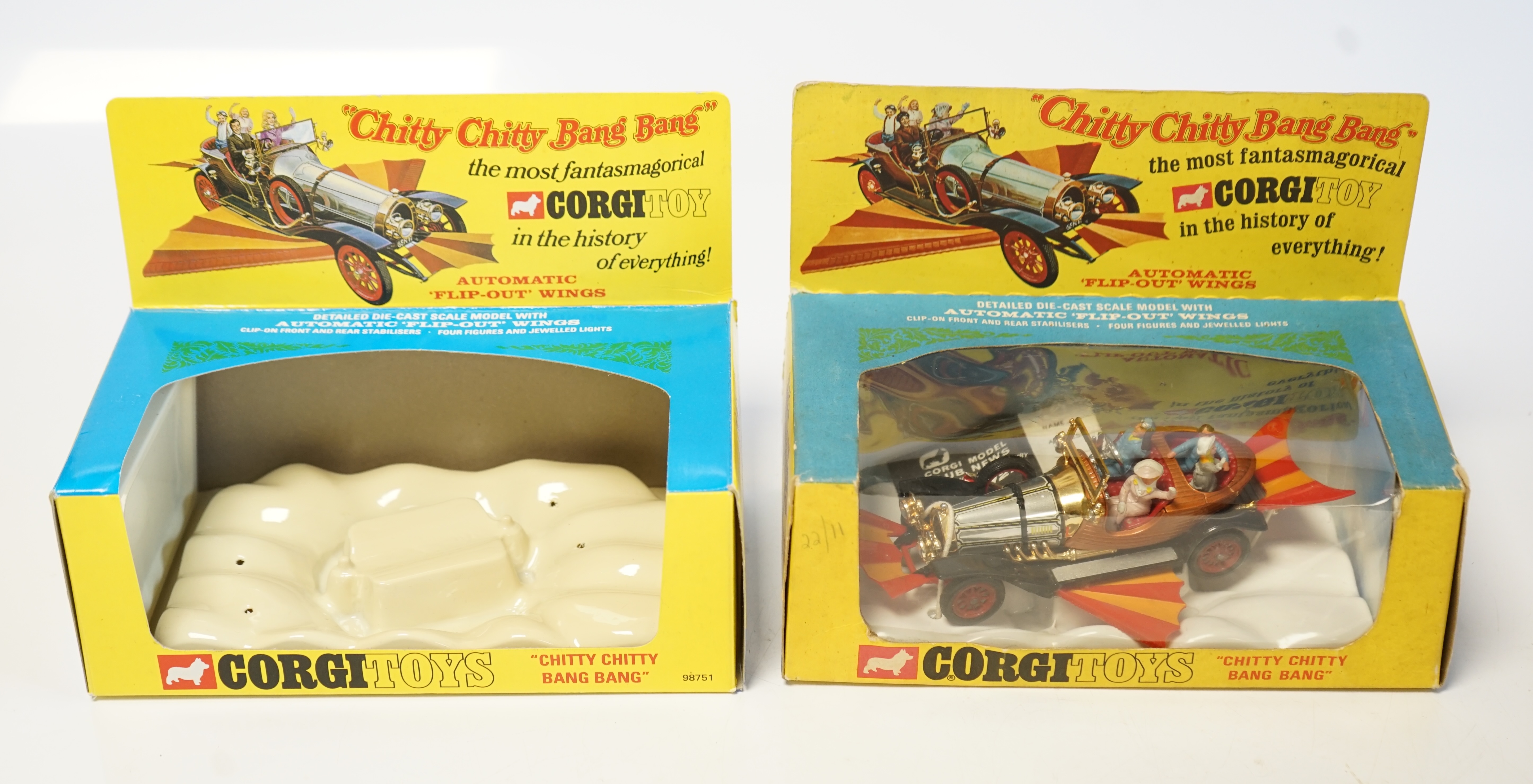 A Corgi Toys Chitty Chitty Bang Bang (266), boxed with inner plastic cloud display stand and reproduction card background, together with an additional reproduction box and cloud display stand. Condition - fair to good -